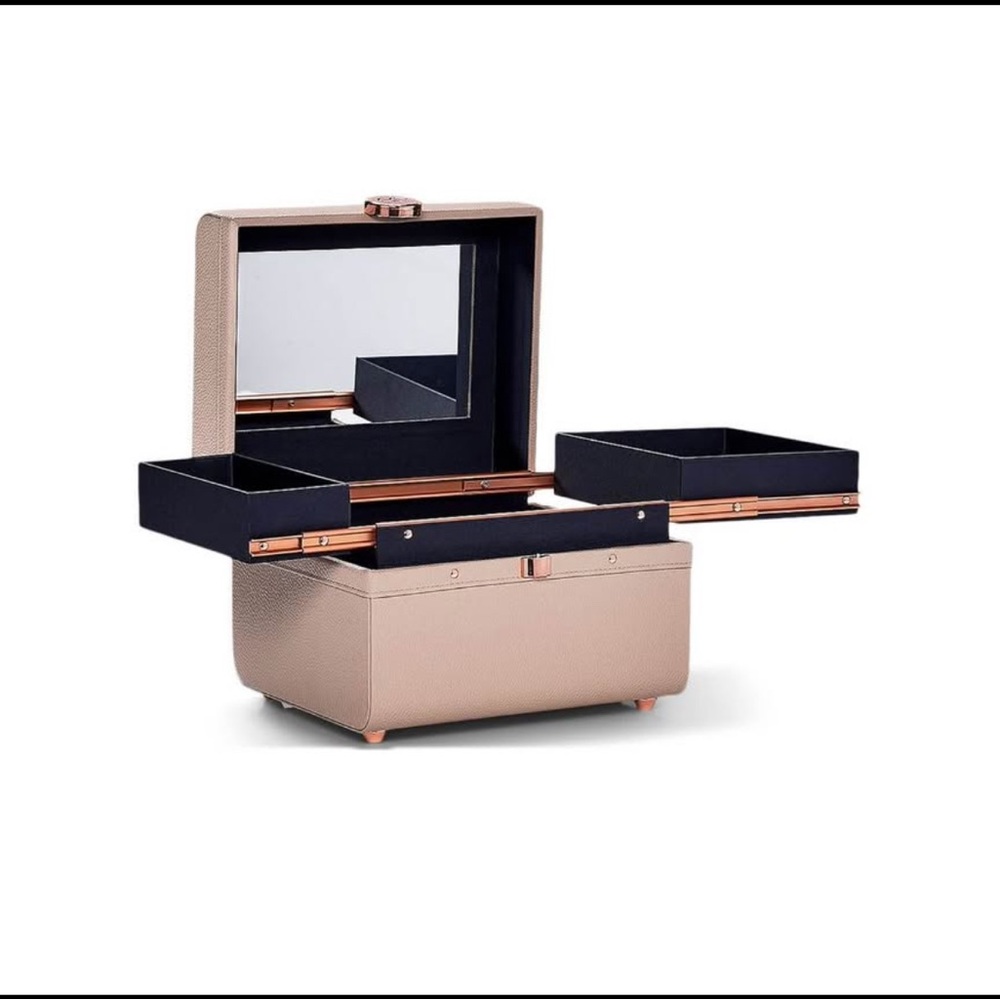 Caboodles lifestyle train makeup or jewelry box with tresluce highlighter